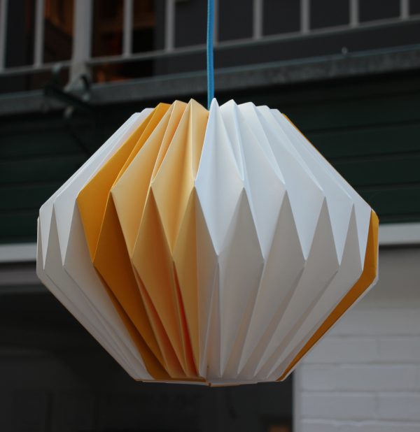 Take home a paper folded artwork by Kate Colin